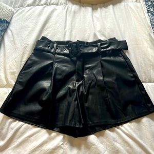 Pleather black shorts perfect alone or with tights and boots!